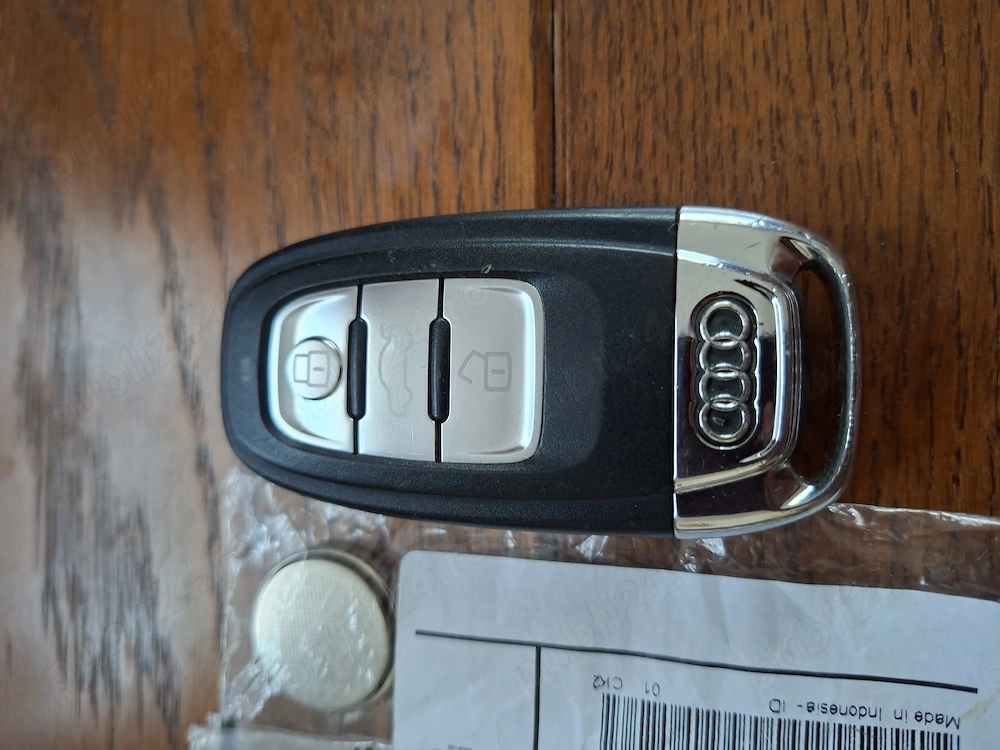 Cheie originală cu telecomandă pentru Audi A6 - 2012