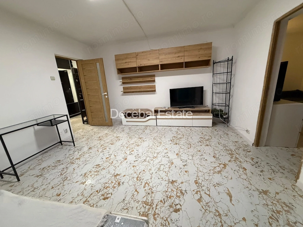 2 Camere  metrou Titan  3 minute Decomandat Etaj 1 Renovat 2026