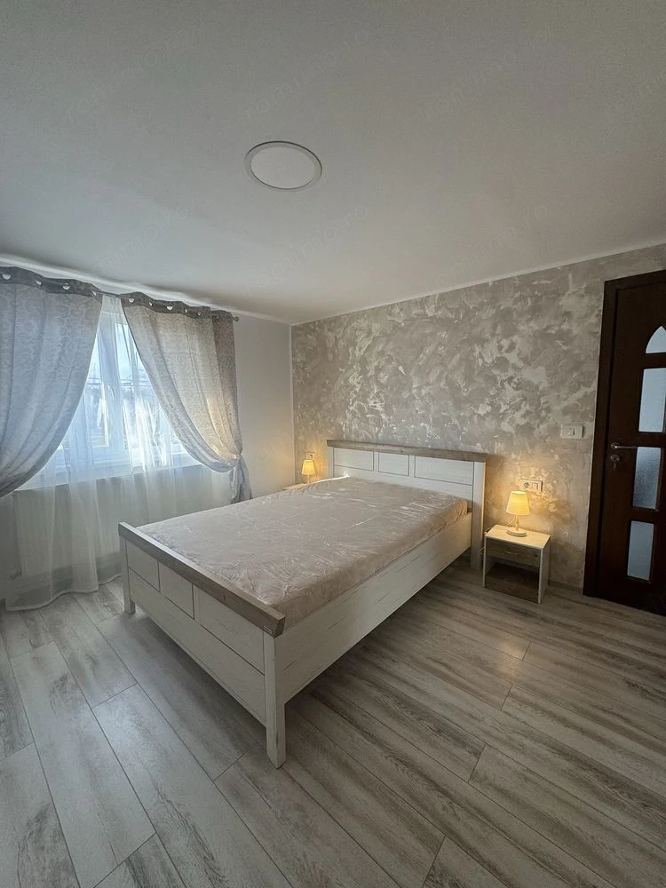 Inchiriez apartament cu 2 camere curte gradina si loc de parcare zona Fratelia