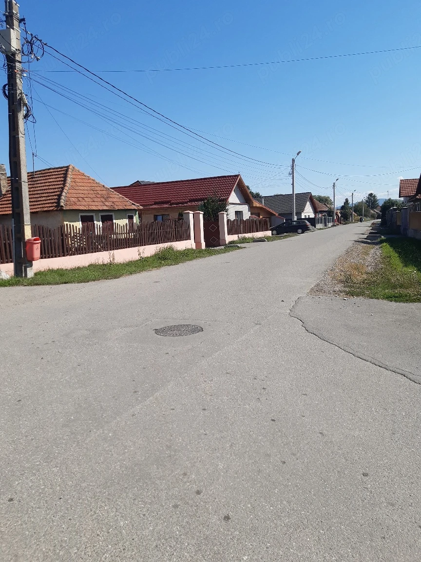 Vand teren construibil intravilan drum asfaltat utilitati zona rezidentiala Lunca Calnicului