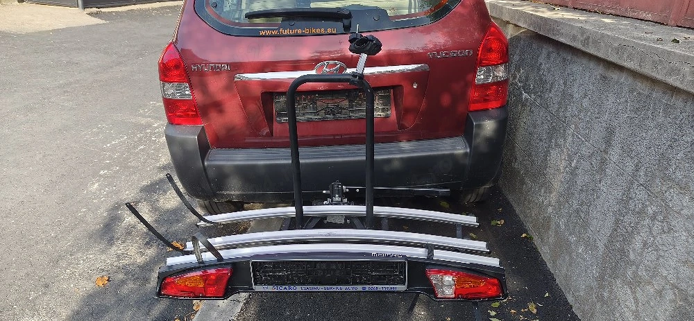 Vând suport Menabo pentru 3 biciclete pe cârligul de remorcare.Rabatabil!