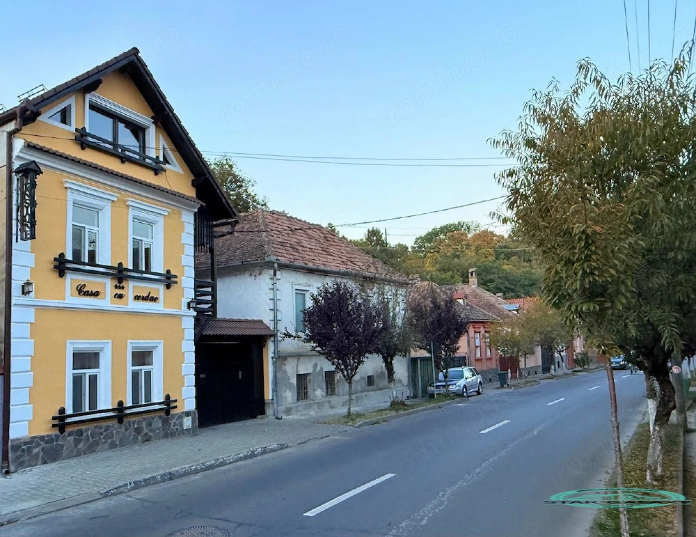 REDUCERE PRET - VAND PENSIUNE CU 7 CAMERE IN SIGHISOARA LA 800 MP DE CETATE