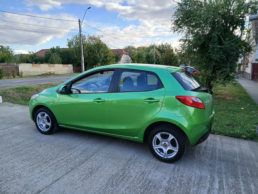 Mazda 2 an 2009 benzina 1.3 klima distribuție lanț adusă recent Germania 