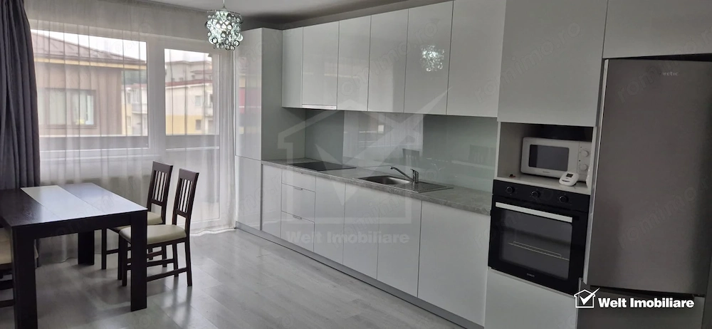 Apartament cu doua dormitoare, parcare proprie, mobilat si utliat