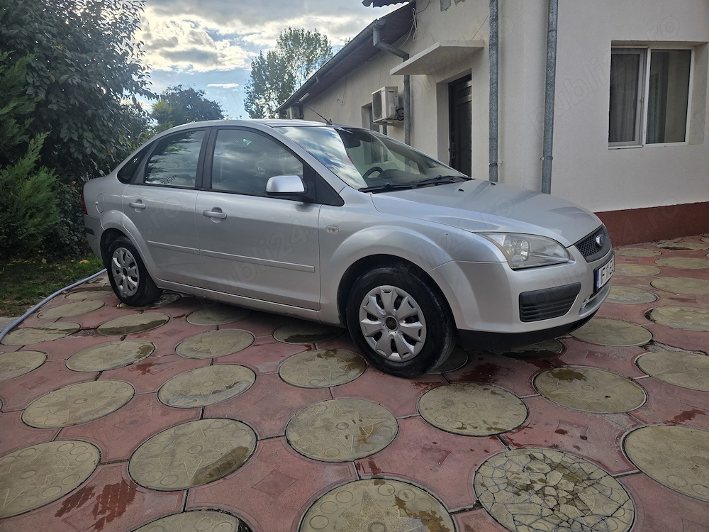 Ford focus 2007.berlina 16 benz.156000km.Perfecta stare+Taxe la zi .Certificat fiscal.Pret 1450 Euro