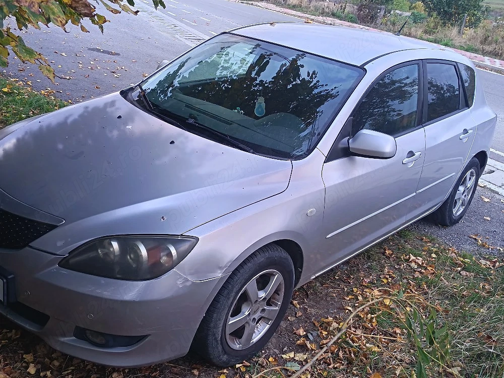 Mazda 3 și W Golf 4 ALH