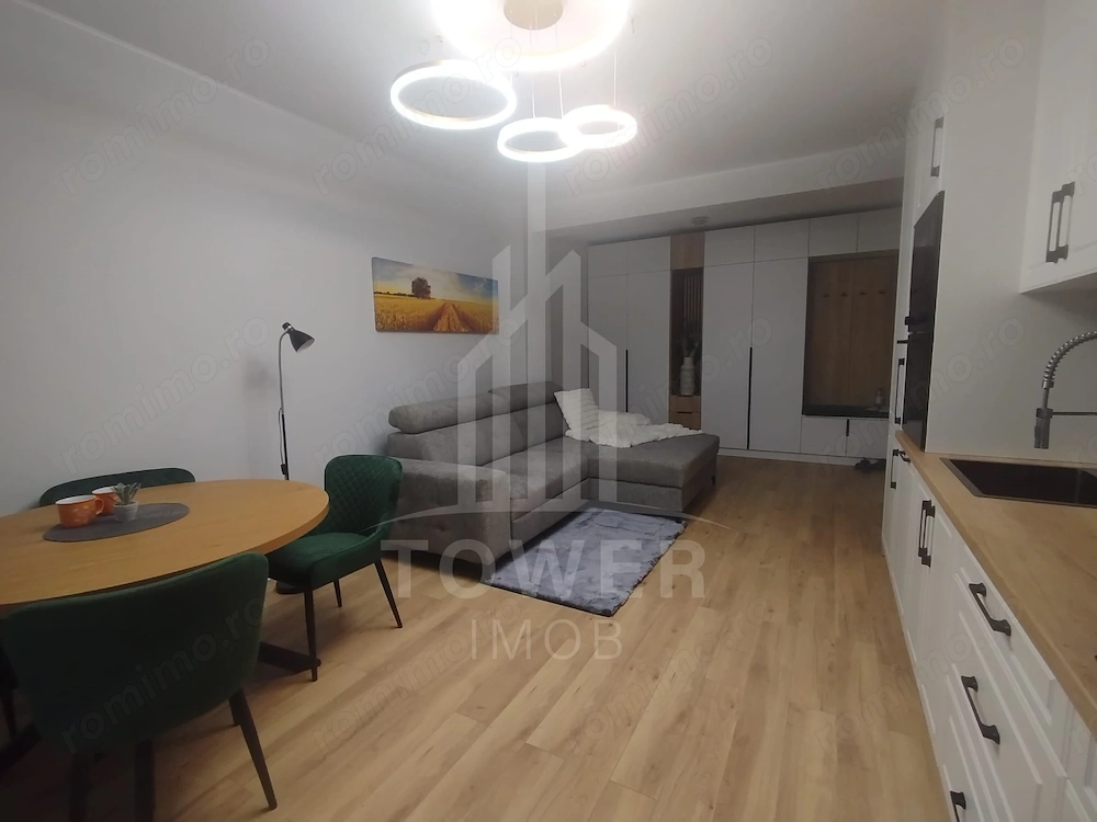 Apartament modern de închiriat, cu balcon și loc de parcare