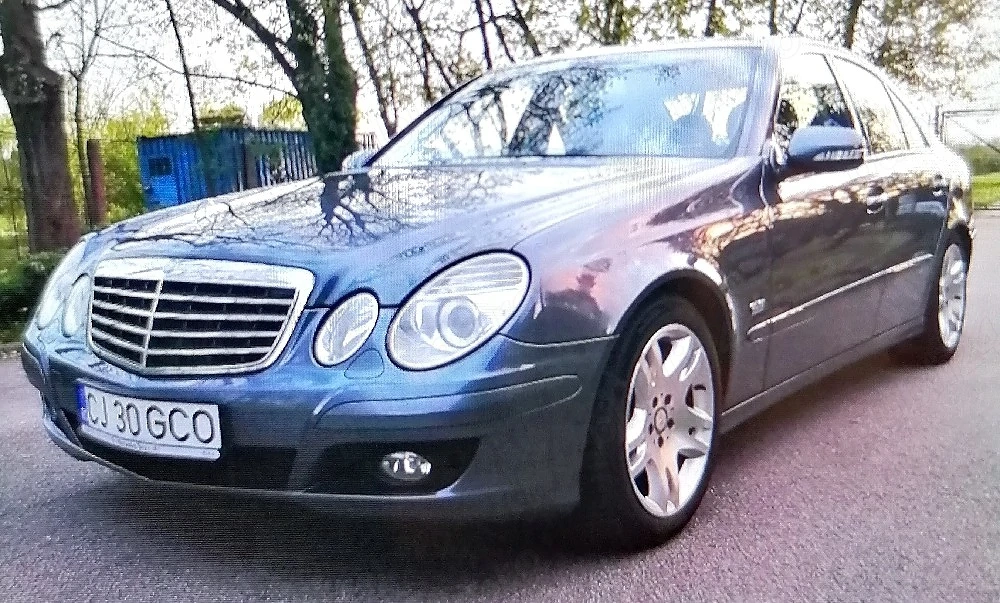 Mercedes-Benz E 200 Kompressor (2006)1.8 benzină 184 cp transmisie aut pachet sport rulaj 211000 km.