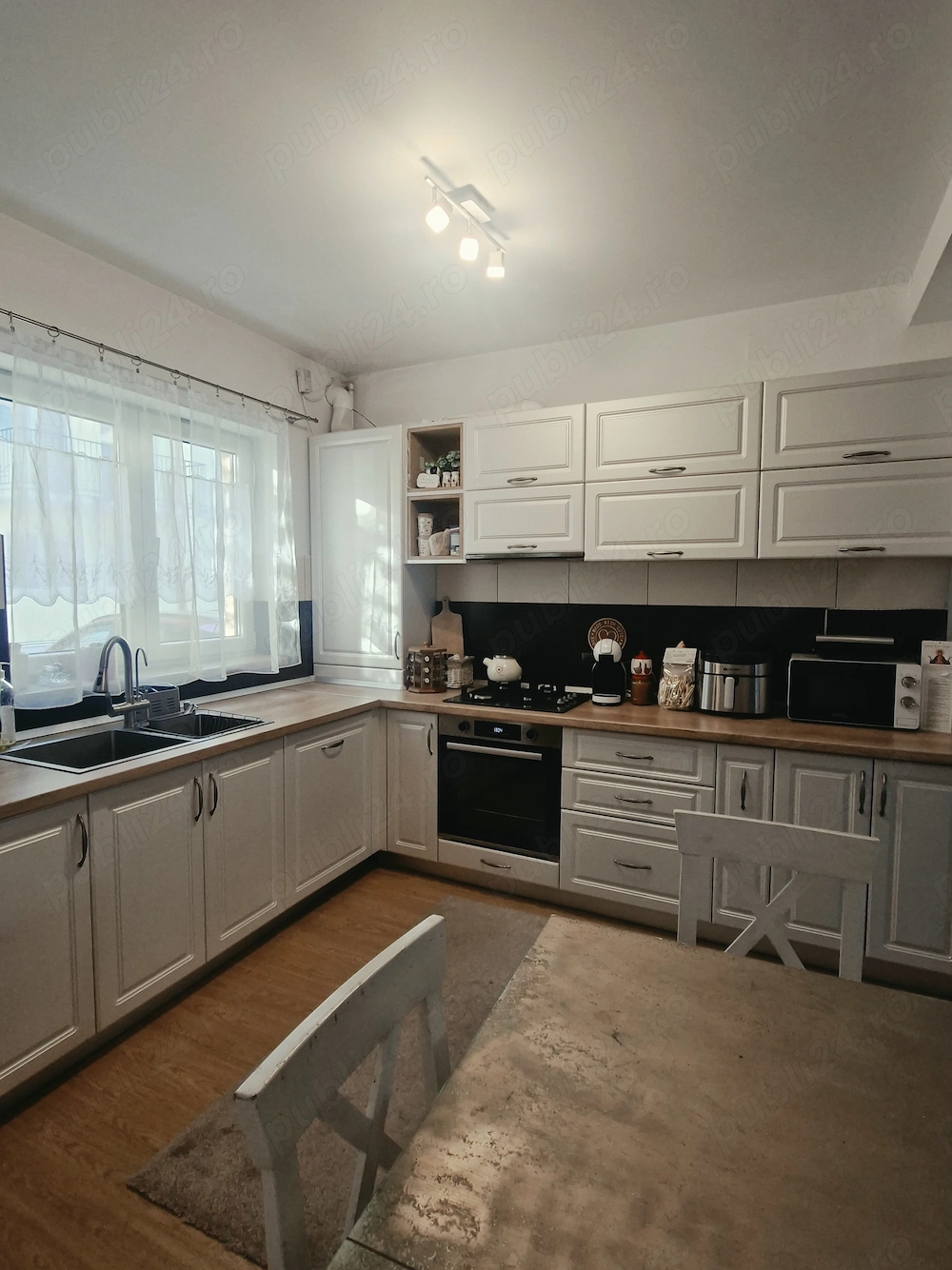 Apartament 4 cam la vilă înșiruită