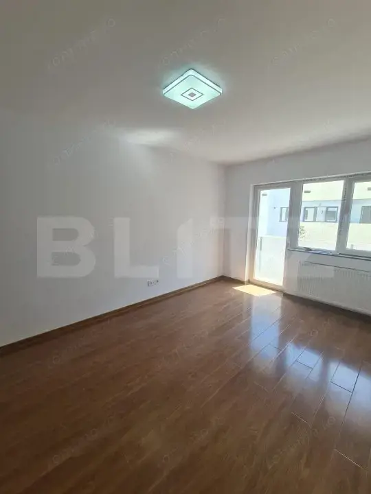 Apartament decomandat, finisaje noi, parcare subterana, zona Terra — fotografia 1