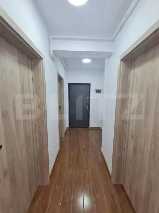 Apartament decomandat, finisaje noi, parcare subterana, zona Terra — fotografia 3