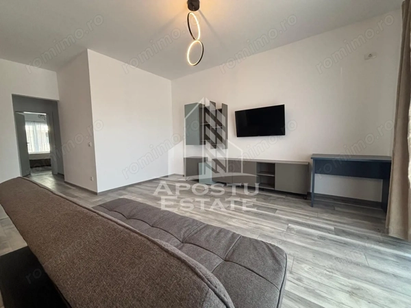 Apartament nou,2 camere si curte de 20 mp,mobilat Torontalului — fotografia 2
