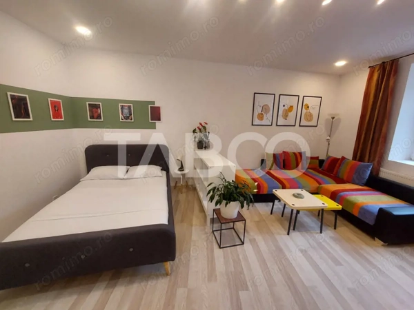 Garsoniera de vanzare 43 mpu pivnita zona Orasul de Jos din Sibiu — fotografia 3