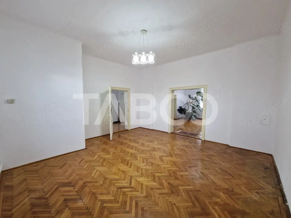 Apartament central 4 camere spatiu comercial garaj si pivnita Sibiu — fotografia 3