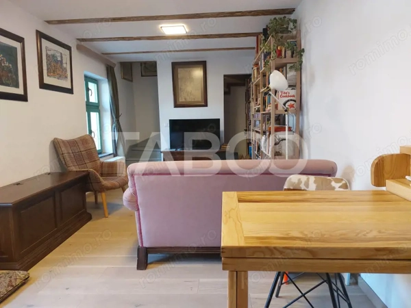 Apartament de vanzare 105 mp 3 camere curte 340 mp in acte Cisnadie — fotografia 3
