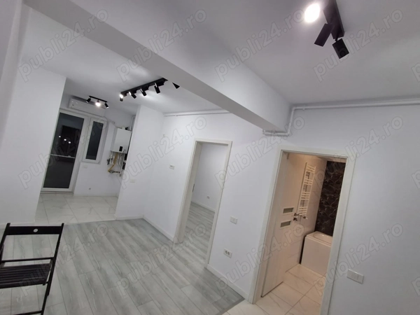 Metrou Berceni, 2 camere in bloc nou cu acte gata, ideal investitie, aer conditionat cadou — fotografia 1