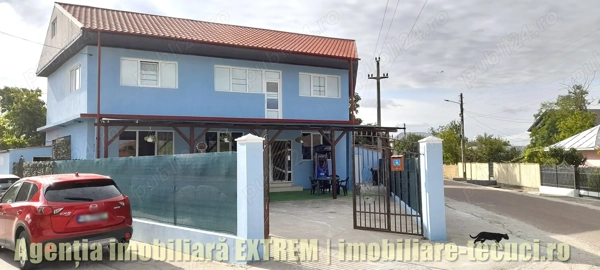 Spaţiu multifuncţional 202mp şi casă de locuit la Drăgăneşti