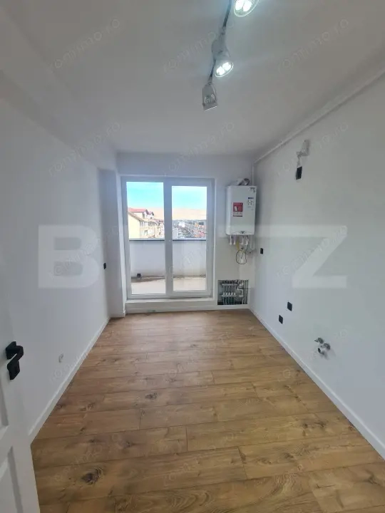 Apartament finisat, 52 mp utili, terasa 34 mp, zona Terra — fotografia 3