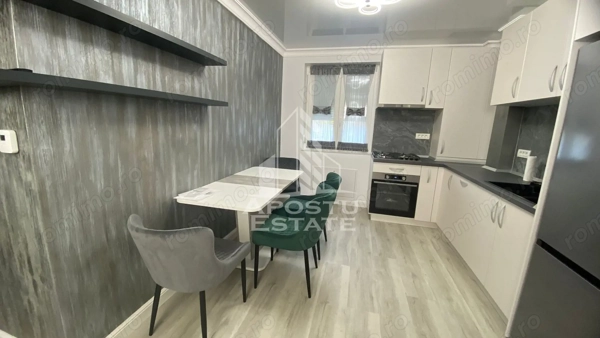 Apartament 2 camere, de închiriat,garaj,centrala proprie, zona Unirii — fotografia 2