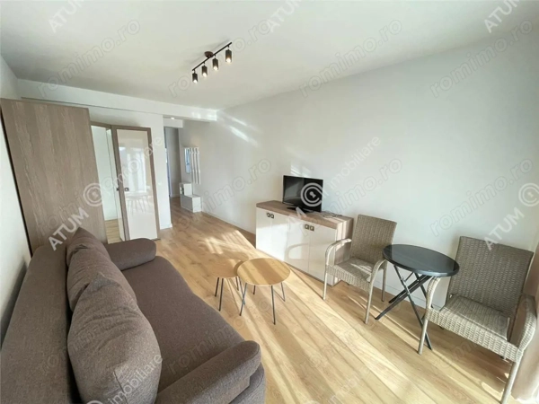 Garsoniera decomandata etaj 1 cu balcon si loc parcare in zona de Vest — fotografia 3