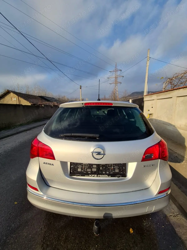 OPEL Astra 2013 — imagine 7