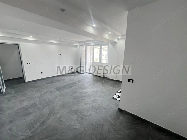 3 camere decomandat Ultracentral totul nou CENTRALA PROPRIE — fotografia 3