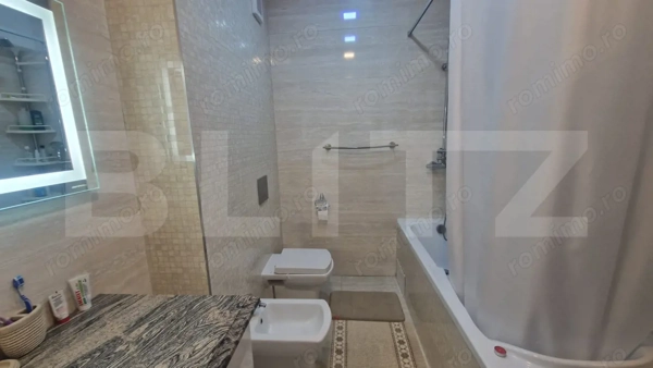 Apartament 3 camere decomandat, 2 bai, 105 mp cu balcon, Tractorul bloc nou — fotografia 3