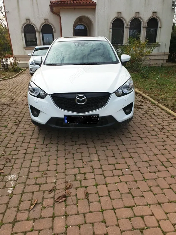 Mazda CX5 cu roți aliaj cu anvelope iarnă de rezervă