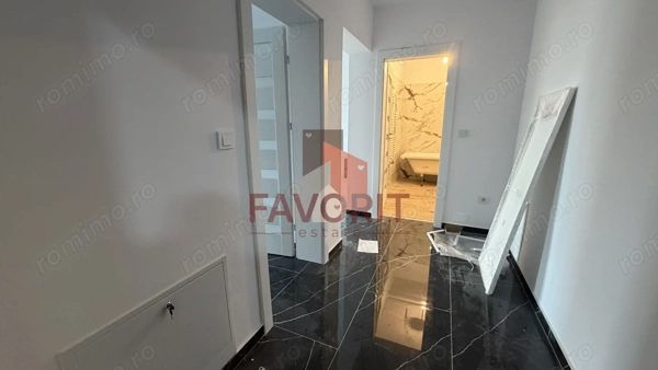 2 camere | Decomandat | La asfalt | Loc de parcare | Statie de autobuz — fotografia 3