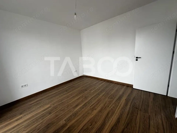 Apartament de vanzare 3 camere 2 bai logie balcon si 1 loc de parcare — fotografia 3