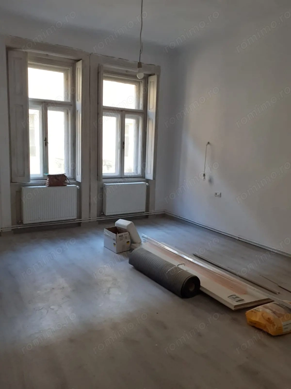 2 cam doua bai centrala proprie zona Iosefin — fotografia 1