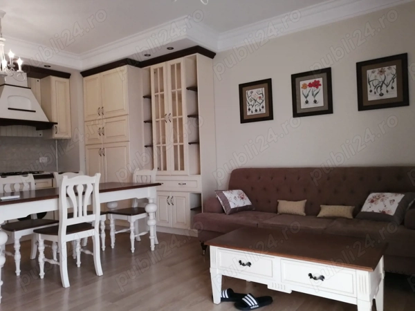 Apartament de lux de inchiriat, amenajat și mobilat, 2camere cu loc de parcare Piața 700 — fotografia 2