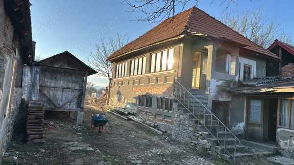 Casă cu teren 1000 mp