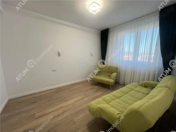 Apartament cu 4 camere si 2 bai situat in Selimbar zona Ion Ratiu — fotografia 3