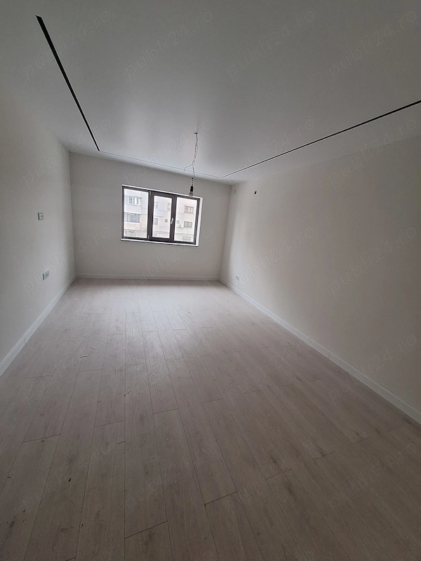 3 camere decomandate Baia Comunala etajul 1 — fotografia 1