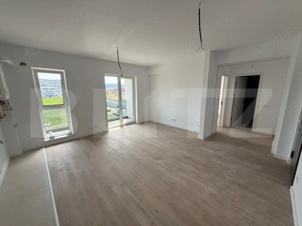 Apartament cu 2 camere, finisat, bloc nou, cu parcare subterana — fotografia 1