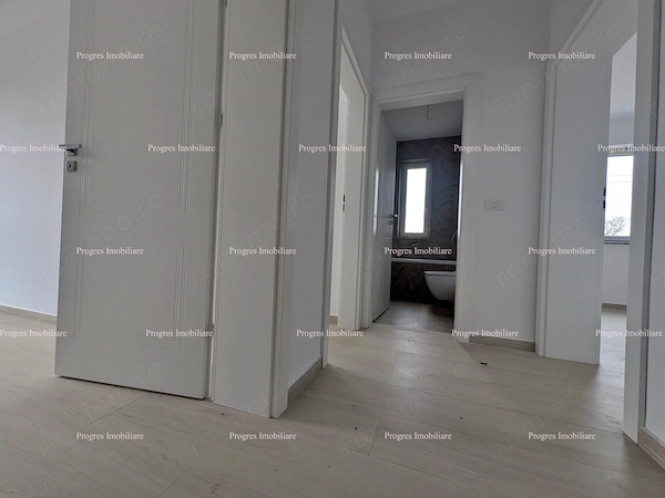 Ap.2 camere decomandat-Bloc nou-Giroc-Zona Eso-Etaj 2-54 mp utili-1 loc parcare-101.000 (TVA inclus) — fotografia 1
