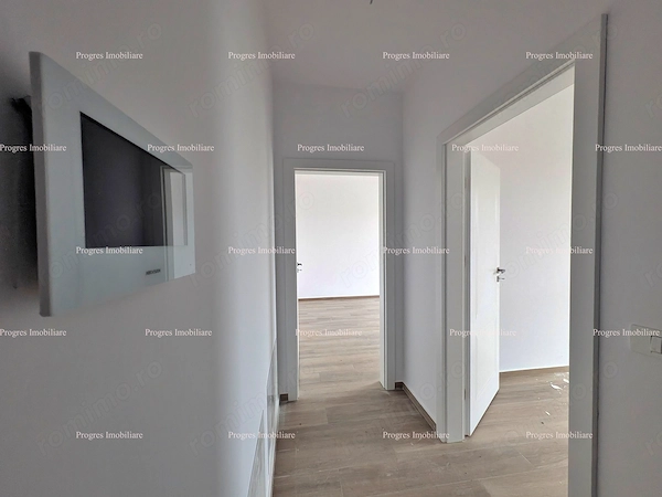Ap.2 camere-Bloc nou-Etaj 2-Giroc-Zona Eso-54 mp-decomandat-1 loc parcare- (TVA inclus) — fotografia 1