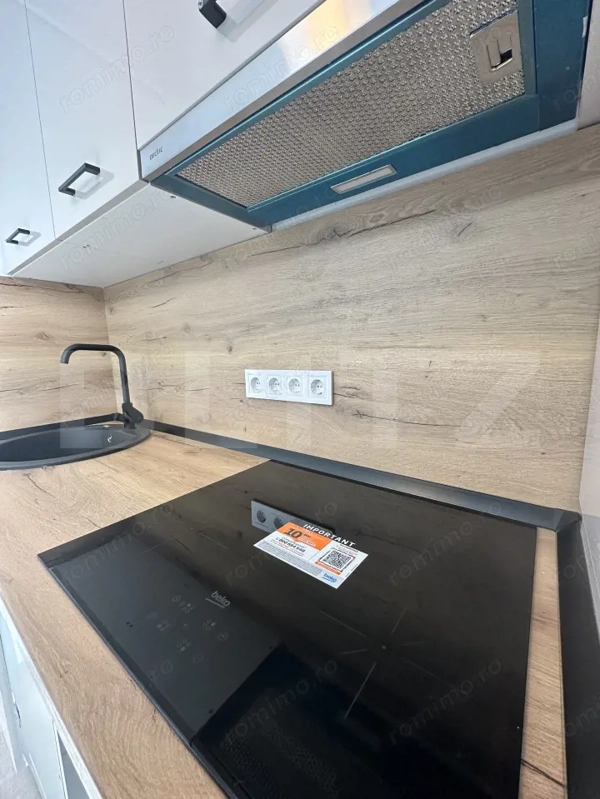 De vânzare apartament 3 camere decomandat – 66,49 mp – complet renovat — fotografia 3