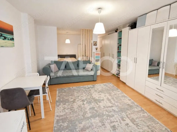 Garsoniera de vanzare 47 mp utili cu o mica gradina de 17 mp — fotografia 1