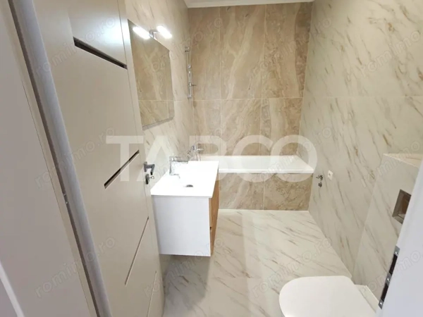 Apartament 3 camere decomandat - 2 bai - balcon - parcare - intabulat — fotografia 3