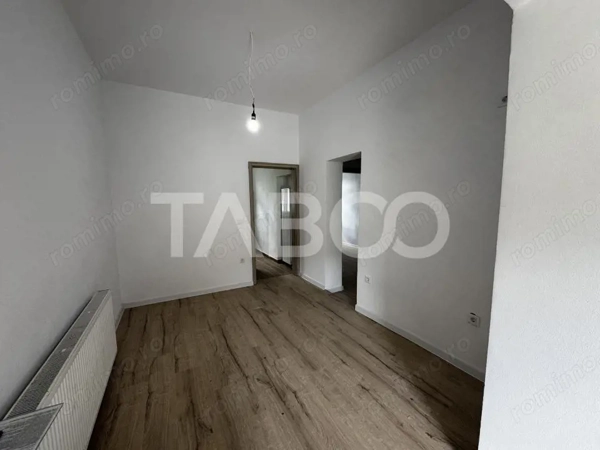 Apartament renovat la casa 3 camere 60 mpu pivnita Piata Cluj Sibiu — fotografia 3