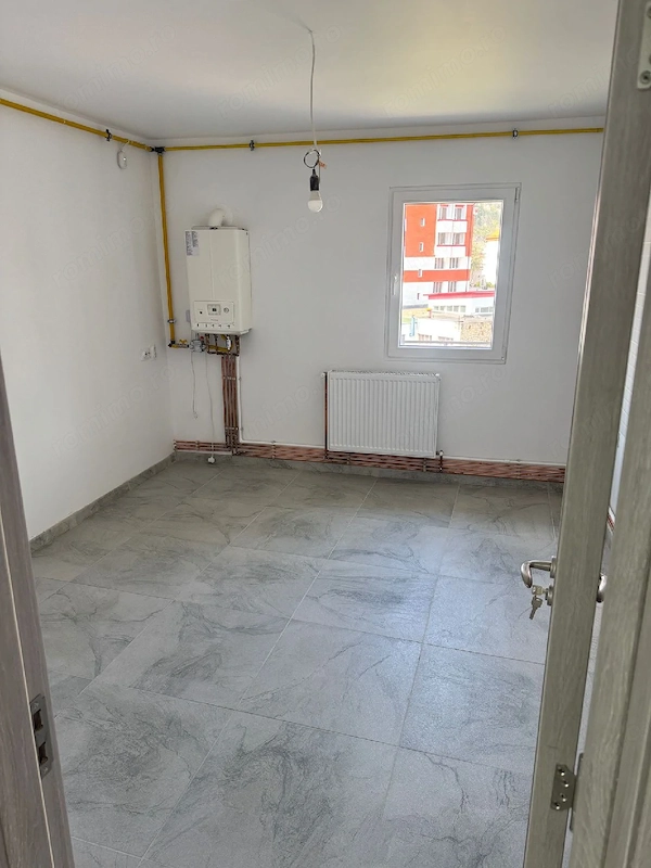 Apartament 2 camere decomandat, Tg. Ocna — fotografia 3