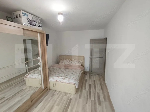 Apartament 3 camere, etaj 7/9 cu lift, 70 mp, zona Micro 6 — fotografia 3