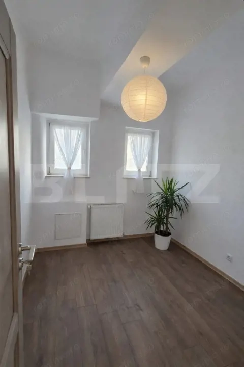 Apartament de 3 camere, 61 mp, zonă centrală — fotografia 3