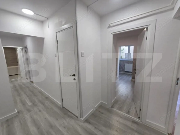Apartament 3 camere, 77 mp, parter, locuit/birouri, zona Sud-Est — fotografia 3