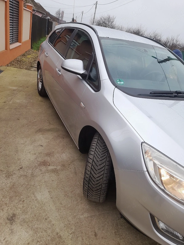 OPEL Astra 2013 — imagine 7
