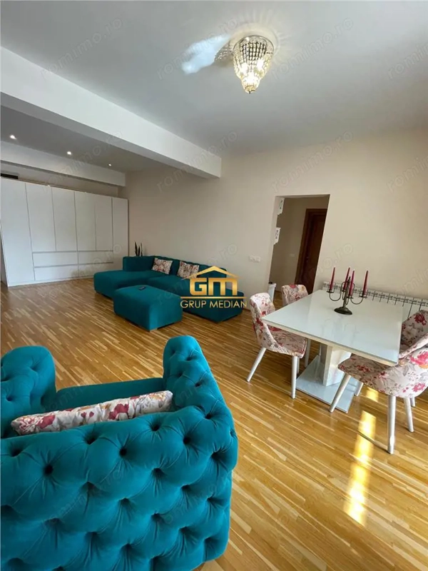 Apartament 2 camere de vanzare - zonă centrală, bloc nou, terasă generoasă și garaj subteran — fotografia 2