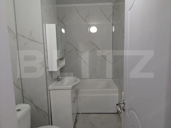 Apartament 2 camere, renovat, 50 mp, zona Micro 11 — fotografia 3
