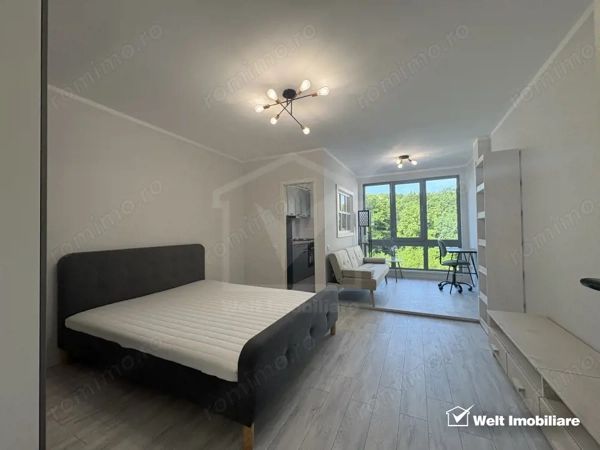 Apartament cu o camera, acces facil catre oras si priveliste catre padure — fotografia 1